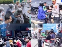 Pengantri BBM di SPBU Pertamina 142011166 Singapore Station 2 Memperoleh Air Mineral dari Satlantas Polrestabes Medan